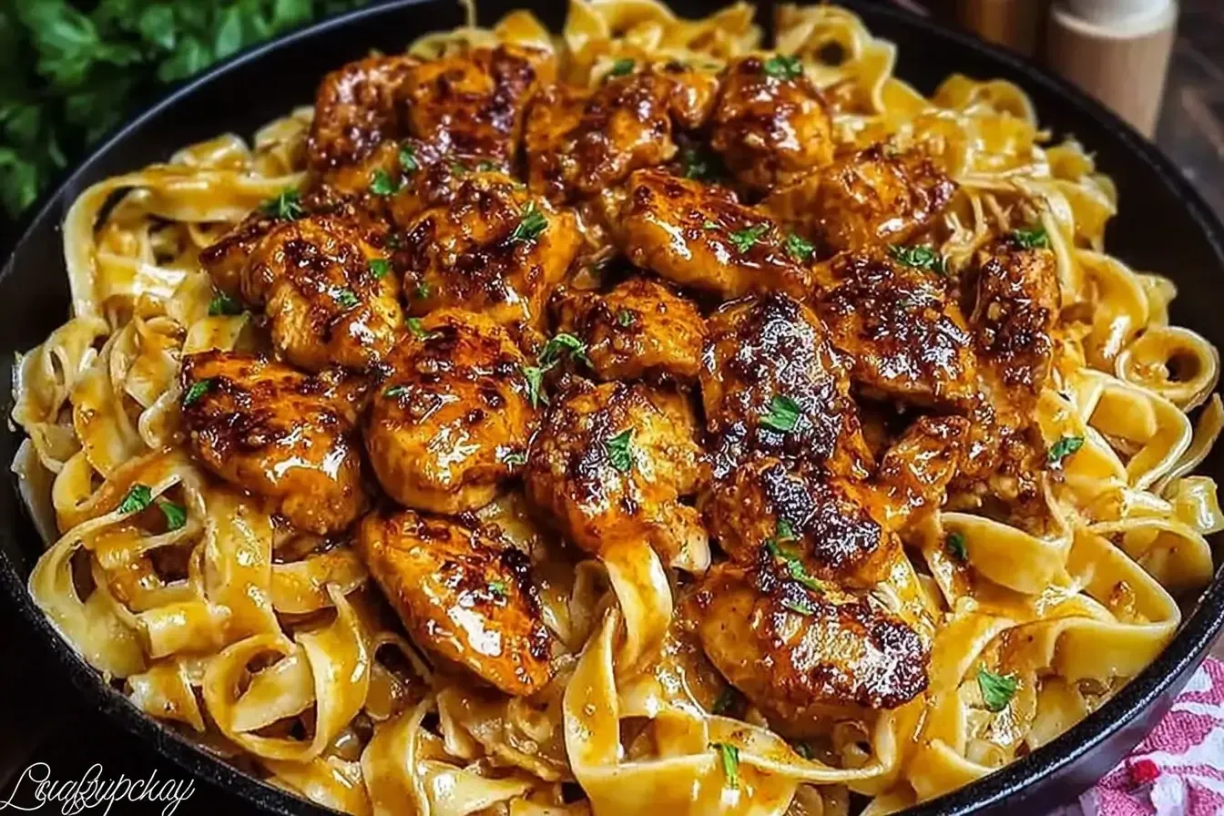 Creamy 25-Min Cajun Honey Butter Chicken Pasta, a spicy-sweet weeknight dinner finished with fresh herbs.